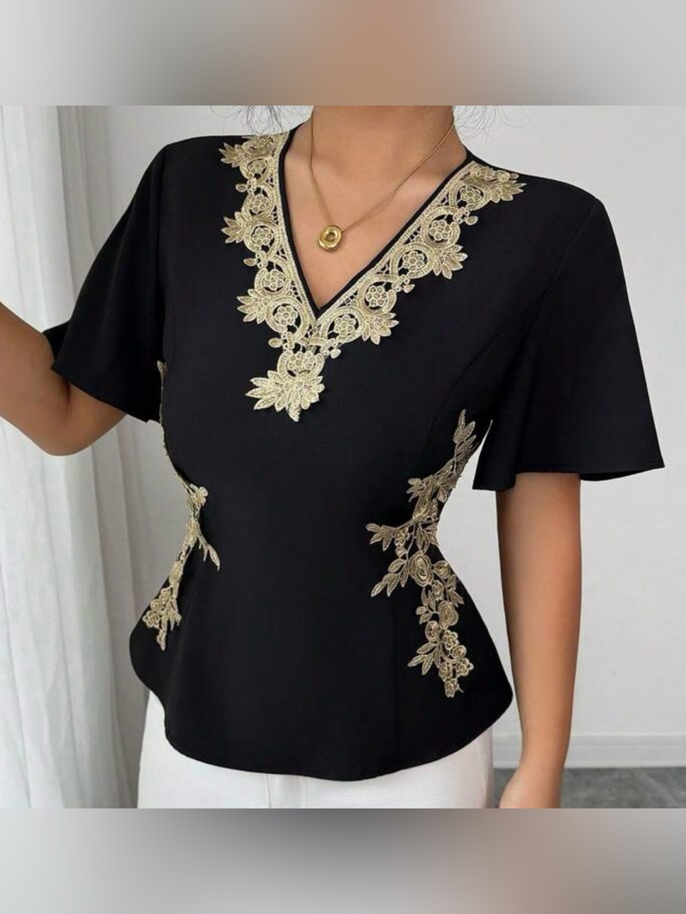 Elegant Black V-Neck Top with Gold Lace Embroidery